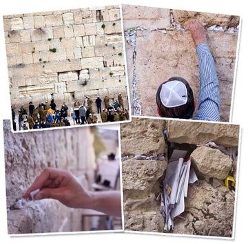 People at Western Wall, also known as Kotel in Jerusalem, leaving heartfelt notes
