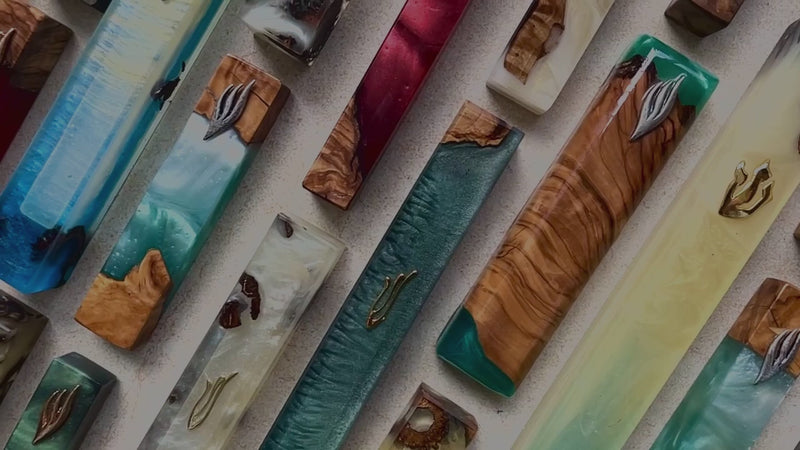 Variaty of colorful Mezuzah Cases